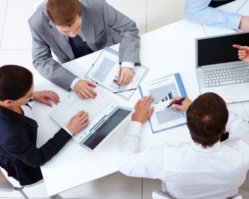 top-view-co-workers-planning-strategy_1098-2959
